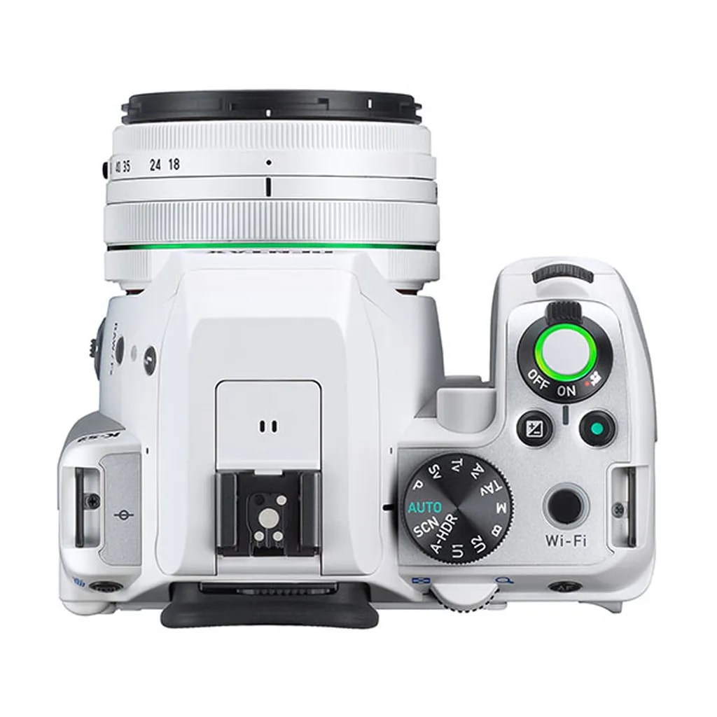 عکس 1. دوربین عکاسی پنتاکس KS2 و پیچ حالتهای دوربین برای عکاسی با تنظیمات مختلف