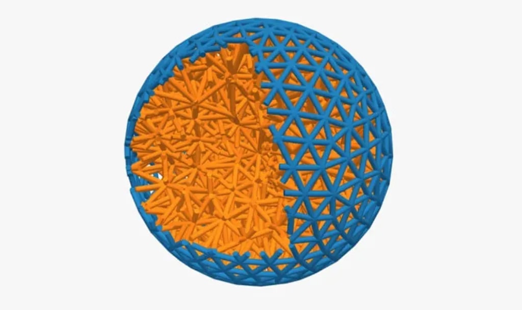 ماده فعال یا کنشگر: این مدلسازی سهبعدی، توپ منعطفی را نشان میدهد (نارنجی) که لایهای از رباتهای ریز (آبی) آنرا احاطه کرده است. پژوهشگران میکوشند با بهرهگیری از چنین ساختاری، شکل و رفتار رباتها را برنامهریزی کنند.